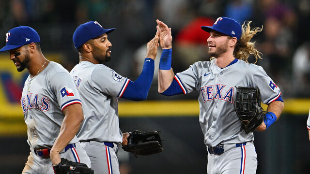 CHICAGO, ILLINOIS - AUGUST 28: Travis Jankowski #16 of the Texas Rangers celebrates after the 4-3 win against the Chicago White Sox during game two of a doubleheader at Guaranteed Rate Field on August 28, 2024 in Chicago, Illinois.