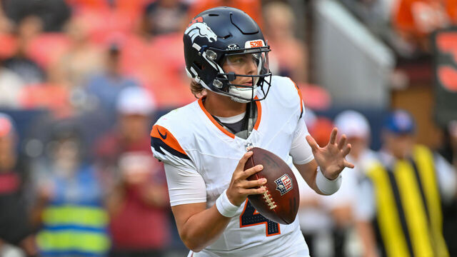 DENVER, CO - AUGUST 25: Denver Broncos quarterback Zach Wilson (4) looks for a receiver during an NFL preseason game between the Denver Broncos and the Arizona Cardinals at Empower Field at Mile High Stadium in Denver, CO on August 25, 2024.