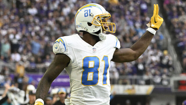 MINNEAPOLIS, MINNESOTA - SEPTEMBER 24: Mike Williams #81 of the Los Angeles Chargers celebrates while scoring a touchdown during the third quarter against the Minnesota Vikings at U.S. Bank Stadium on September 24, 2023 in Minneapolis, Minnesota.