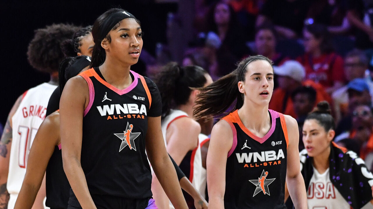 PHOENIX, AZ - JULY 20: Angel Reese #5, and Caitlin Clark #22 of Team WNBA walk during the 2024 WNBA All Star Game on July 20, 2024 at Footprint Center in Phoenix, Arizona. Mandatory Copyright Notice: Copyright 2024 NBAE