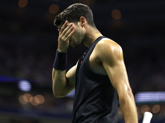 NEW YORK, NEW YORK - AUGUST 29: Carlos Alcaraz of Spain reacts after a point against Botic van De Zandschulp of the Netherlands during their Men's Singles Second Round match on Day Four of the 2024 US Open at USTA Billie Jean King National Tennis Center on August 29, 2024 in the Flushing neighborhood of the Queens borough of New York City.