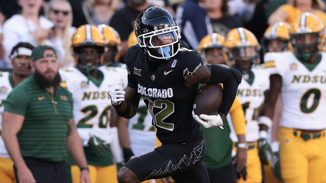 BOULDER, COLORADO - AUGUST 29: Travis Hunter #12 of the Colorado Buffaloes runs with the ball for a touchdown during the first quarter against the North Dakota State Bison at Folsom Field on August 29, 2024 in Boulder, Colorado.
