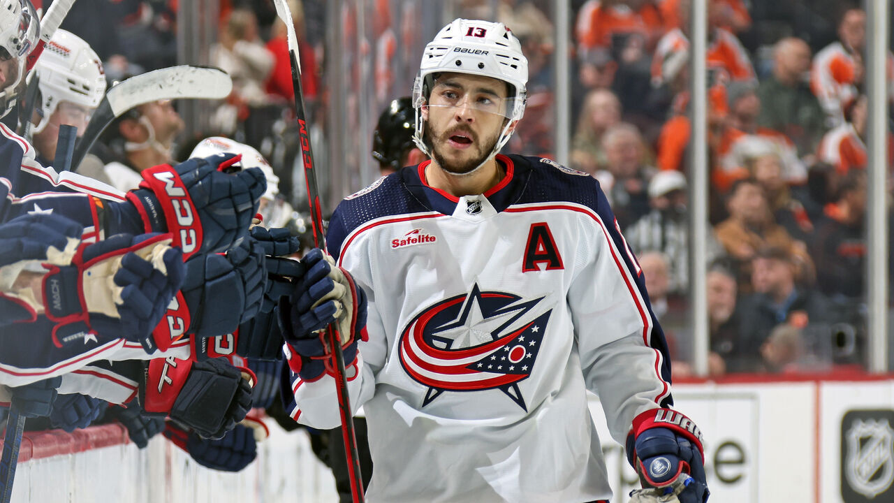 PHILADELPHIA, PENNSYLVANIA - JANUARY 04: Johnny Gaudreau #13 of the Columbus Blue Jackets celebrates with teammates along the bench after scoring the game winning shootout goal against the Philadelphia Flyers at the Wells Fargo Center on January 4, 2024 in Philadelphia, Pennsylvania. The Columbus Blue Jackets defeated the Philadelphia Flyers 3-2 in a shootout.