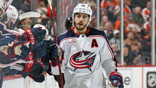 PHILADELPHIA, PENNSYLVANIA - JANUARY 04: Johnny Gaudreau #13 of the Columbus Blue Jackets celebrates with teammates along the bench after scoring the game winning shootout goal against the Philadelphia Flyers at the Wells Fargo Center on January 4, 2024 in Philadelphia, Pennsylvania. The Columbus Blue Jackets defeated the Philadelphia Flyers 3-2 in a shootout.