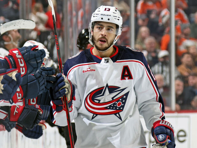 PHILADELPHIA, PENNSYLVANIA - JANUARY 04: Johnny Gaudreau #13 of the Columbus Blue Jackets celebrates with teammates along the bench after scoring the game winning shootout goal against the Philadelphia Flyers at the Wells Fargo Center on January 4, 2024 in Philadelphia, Pennsylvania. The Columbus Blue Jackets defeated the Philadelphia Flyers 3-2 in a shootout.