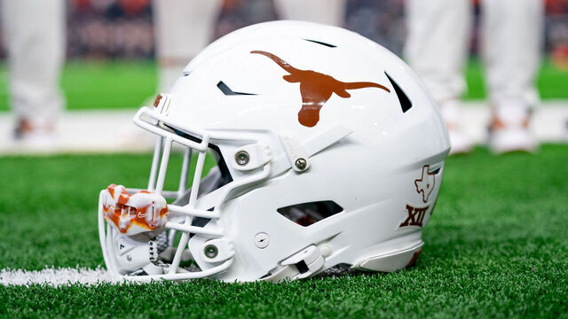 ARLINGTON, TX - DECEMBER 02: Texas Longhorns helmet sits on the sidelines during the Big 12 Championship game between the Texas Longhorns and the Oklahoma State Cowboys on December 02, 2023 at AT&T Stadium in Arlington, TX.