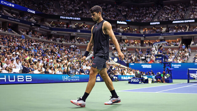 TOPSHOT - Spain's Carlos Alcaraz reacts following a point against Netherlands' Botic van De Zandschulp during their men's singles second round tennis match on day four of the US Open tennis tournament at the USTA Billie Jean King National Tennis Center in New York City, on August 29, 2024.