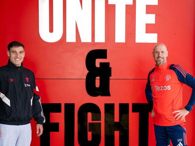MANCHESTER, ENGLAND - AUGUST 30: (EXCLUSIVE COVERAGE) Manuel Ugarte of Manchester United poses with Manager Erik ten Hag after signing for the club at Carrington Training Ground on August 30, 2024 in Manchester, England.