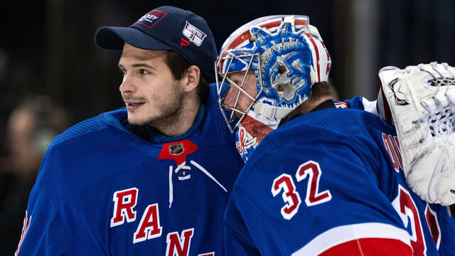 NEW YORK, NEW YORK - MARCH 11: Jonathan Quick #32 and Igor Shesterkin #31 of the New York Rangers celebrate a win over the New Jersey Devils at Madison Square Garden on March 11, 2024 in New York City.