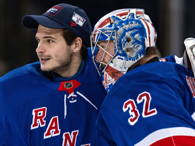 NEW YORK, NEW YORK - MARCH 11: Jonathan Quick #32 and Igor Shesterkin #31 of the New York Rangers celebrate a win over the New Jersey Devils at Madison Square Garden on March 11, 2024 in New York City.