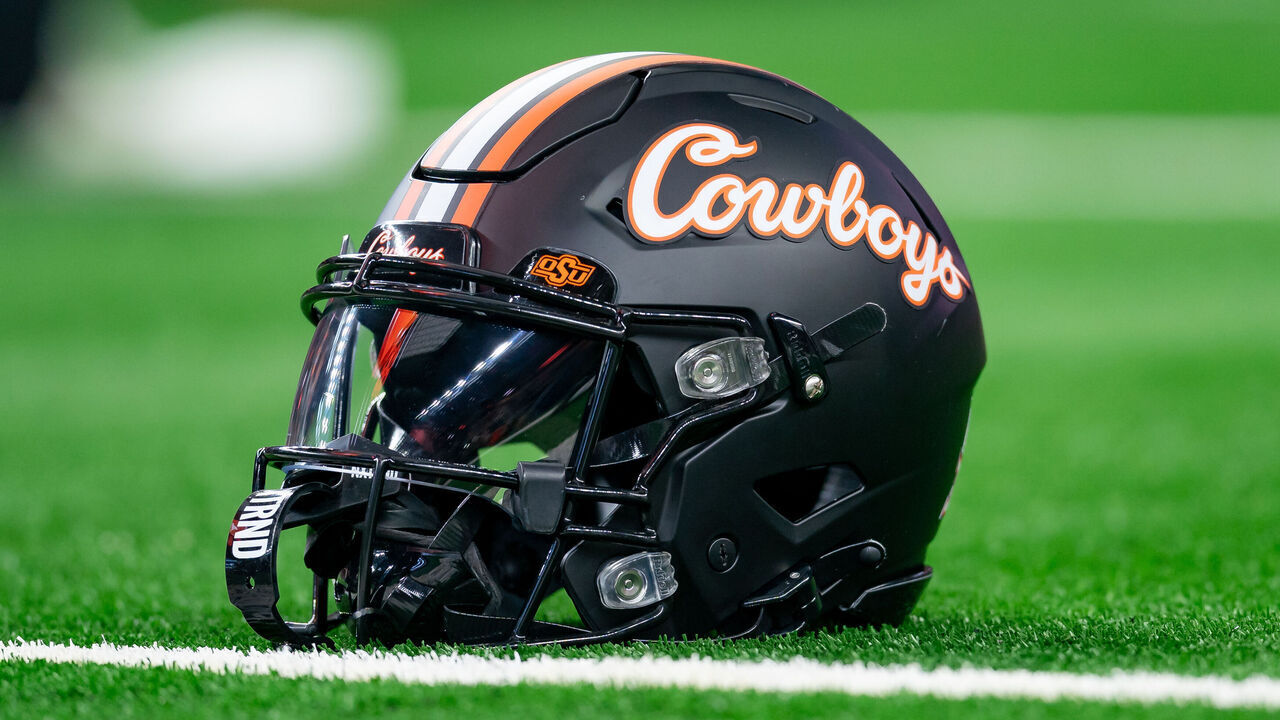 ARLINGTON, TX - DECEMBER 02: Oklahoma State Cowboys helmet sits during warmsups before the Big 12 Championship game between the Texas Longhorns and the Oklahoma State Cowboys on December 02, 2023 at AT&T Stadium in Arlington, TX.