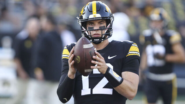IOWA CITY, IOWA- SEPTEMBER 30: Quarterback Cade McNamara #12 of the Iowa Hawkeyes warms up before the match-up against the Michigan State Spartans at Kinnick Stadium on September 30, 2023 in Iowa City, Iowa.