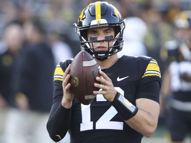 IOWA CITY, IOWA- SEPTEMBER 30: Quarterback Cade McNamara #12 of the Iowa Hawkeyes warms up before the match-up against the Michigan State Spartans at Kinnick Stadium on September 30, 2023 in Iowa City, Iowa.