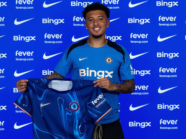 COBHAM, ENGLAND - AUGUST 31: Jadon Sancho poses for pictures as he signs for Chelsea Football Club at Chelsea Training Ground on August 30, 2024 in Cobham, England.