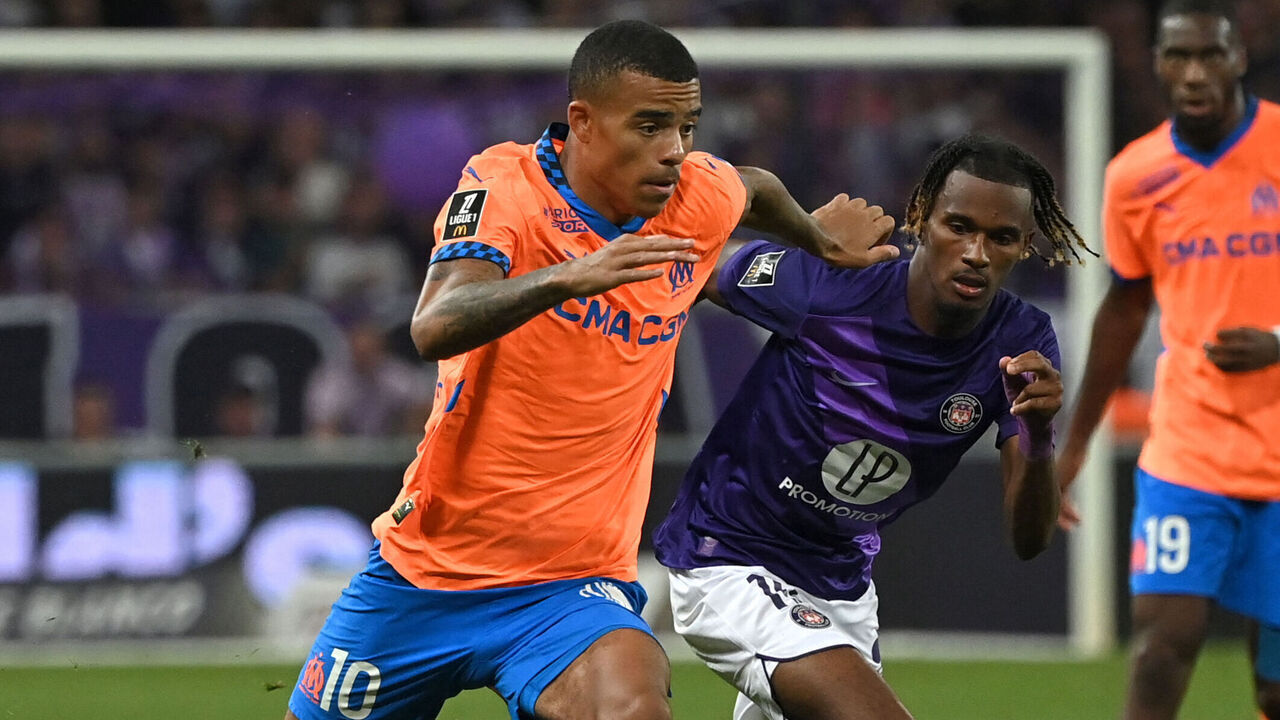 Marseille's English forward #10 Mason Greenwood runs with the ball during the French L1 football match between Toulouse FC and Olympique Marseille (OM) at The TFC Stadium in Toulouse, south-western France on August 31, 2024.