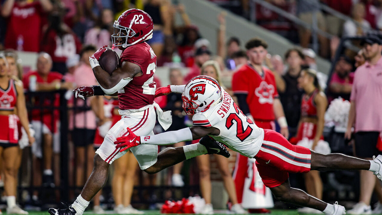 TUSCALOOSA, ALABAMA - AUGUST 31: Justice Haynes #22 of the Alabama Crimson Tide goes in for a first half touchdown against the Western Kentucky Hilltoppers at Bryant-Denny Stadium on August 31, 2024 in Tuscaloosa, Alabama.