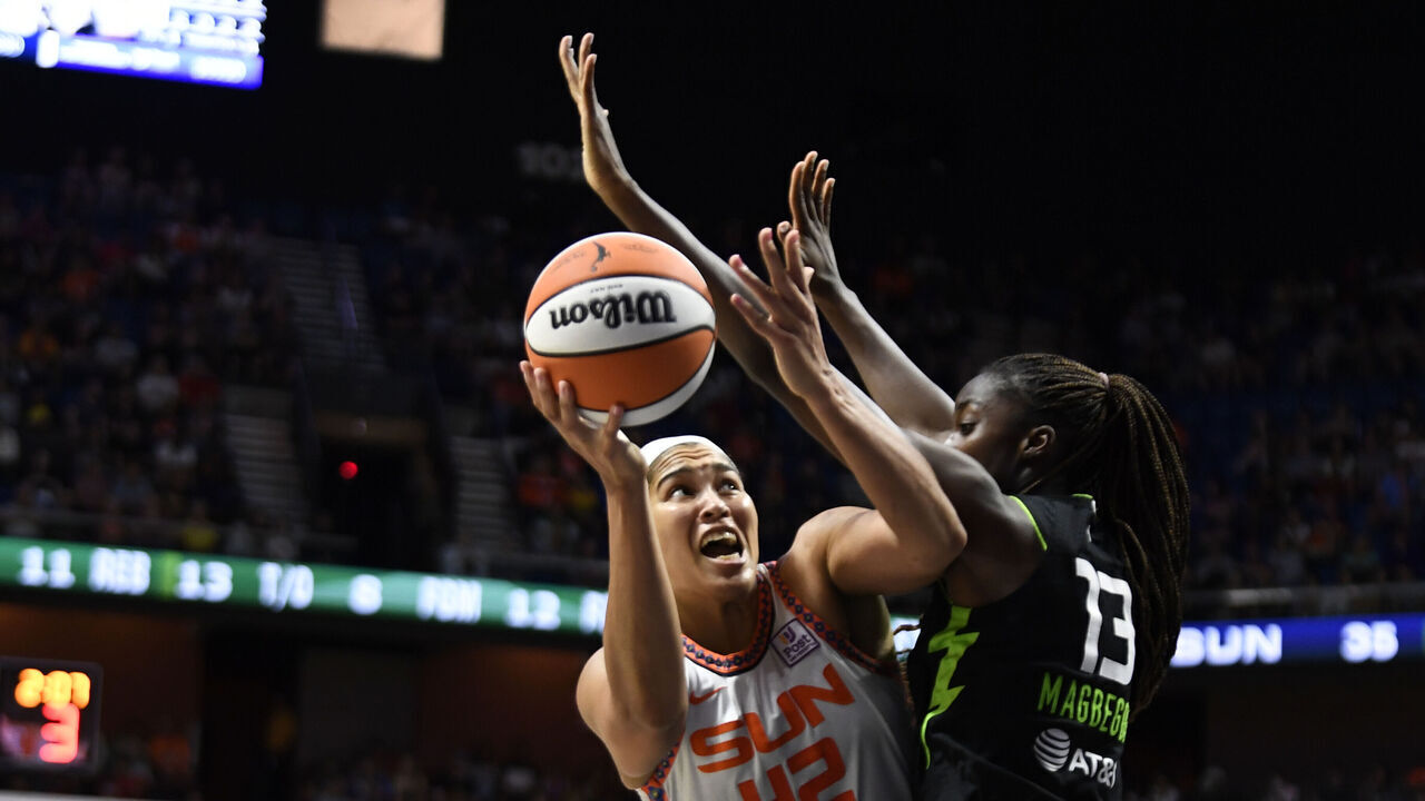 UNCASVILLE, CT - SEPTEMBER 01: Connecticut Sun forward Brionna Jones (42) handles the ball during a WNBA game between the Seattle Storm and the Connecticut Sun on September 1, 2024, at Mohegan Sun Arena, in Uncasville, CT.