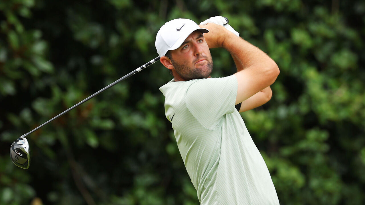 ATLANTA, GEORGIA - SEPTEMBER 01: Scottie Scheffler of the United States hits his shot from the 13th tee during the final round of the TOUR Championship at East Lake Golf Club on September 01, 2024 in Atlanta, Georgia.