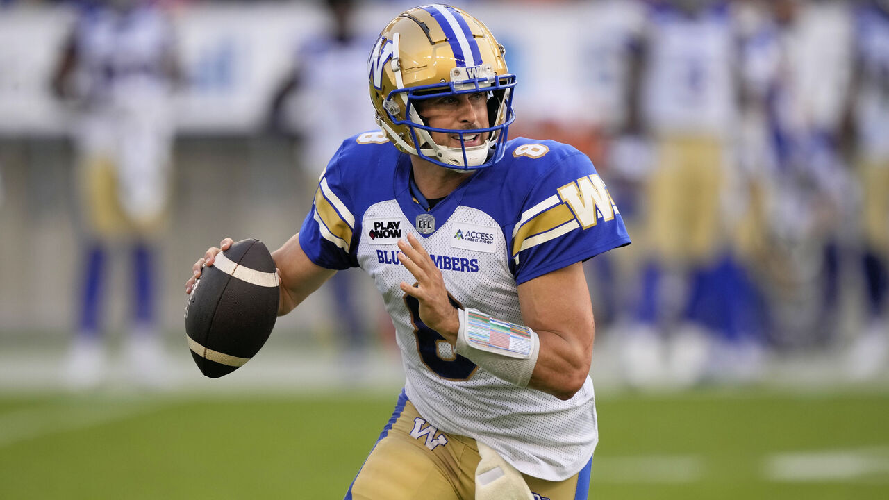 TORONTO, CANADA - JULY 27: Zach Collaros #8 of the Winnipeg Blue Bombers rolls out to pass against the Toronto Argonauts during the first half at BMO Field on July 27, 2024 in Toronto, Canada.