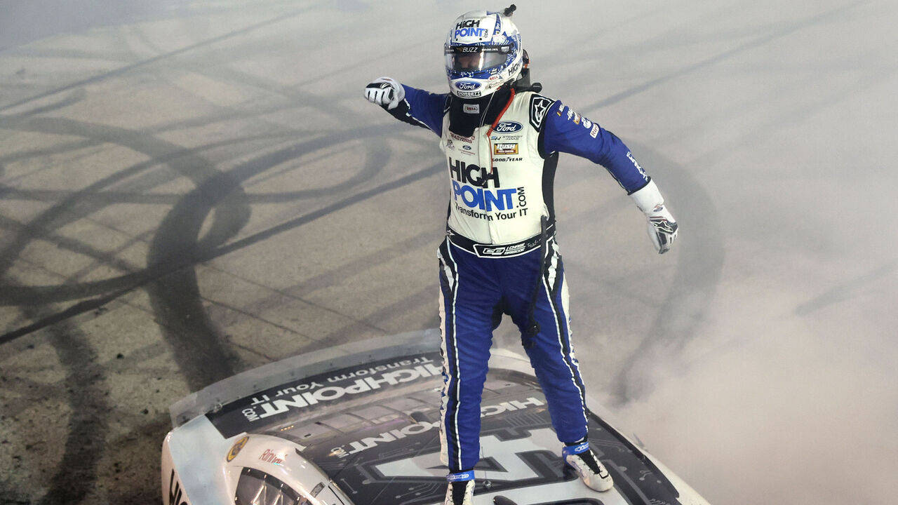 DARLINGTON, SOUTH CAROLINA - SEPTEMBER 01: Chase Briscoe, driver of the #14 HighPoint.com Ford, celebrates after winning the NASCAR Cup Series Cook Out Southern 500 at Darlington Raceway on September 01, 2024 in Darlington, South Carolina.