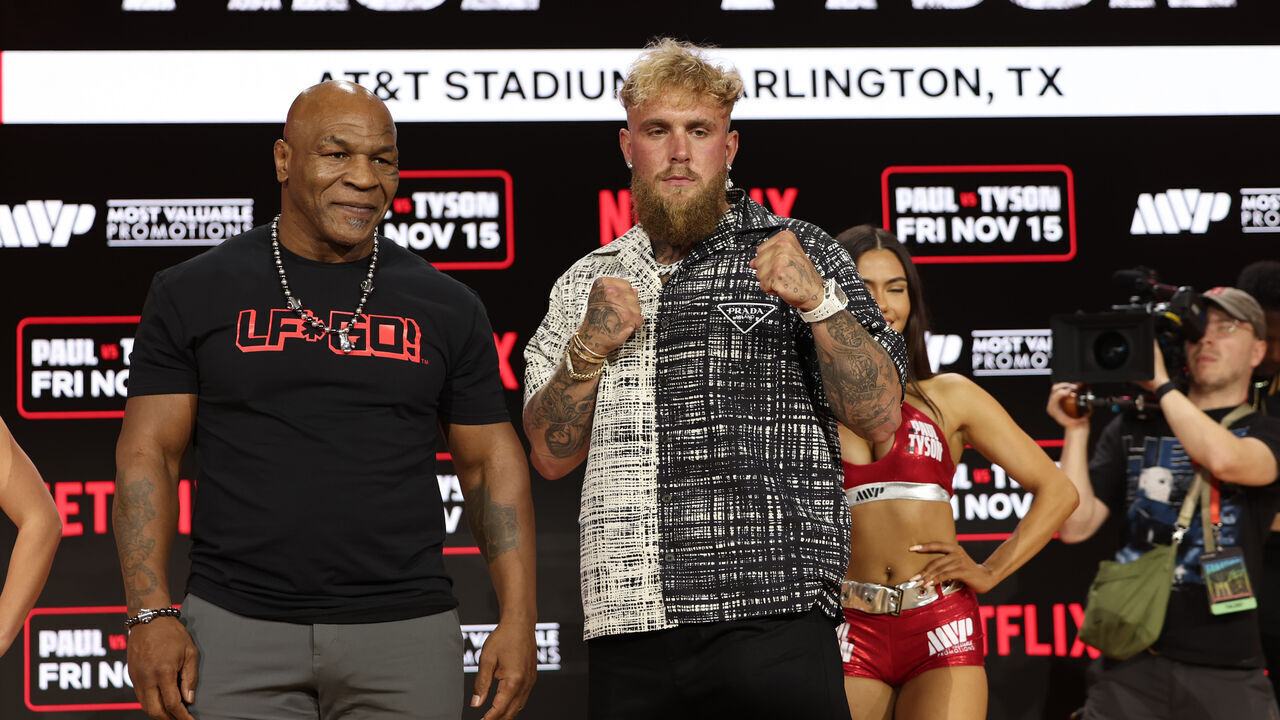 NEW YORK, NEW YORK - AUGUST 18: Mike Tyson and Jake Paul attend Fanatics Fest Press Conference at Javits Center on August 18, 2024 in New York City.