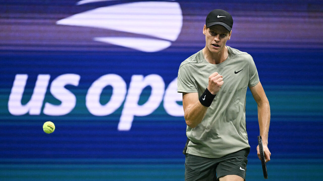 Italy's Jannik Sinner reacts to winning the first set against USA's Tommy Paul during their men's singles round of 16 match on day eight of the US Open tennis tournament at the USTA Billie Jean King National Tennis Center in New York City, on September 2, 2024.