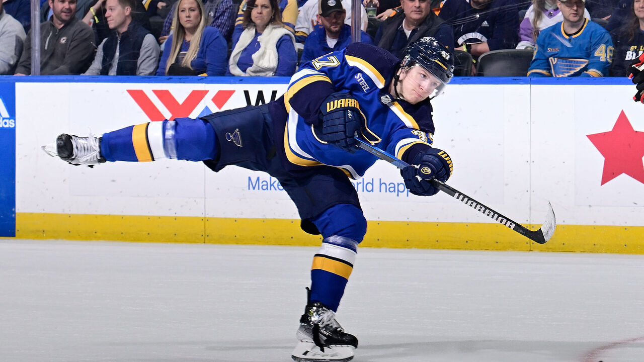 ST. LOUIS, MO - APRIL 10: Torey Krug #47 of the St. Louis Blues takes a shot against the Chicago Blackhawks on April 10, 2024 at the Enterprise Center in St. Louis, Missouri.