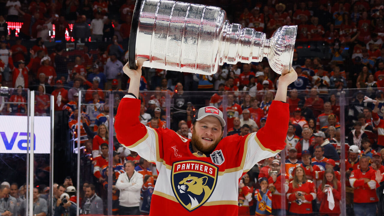 SUNRISE, FLORIDA - JUNE 24: Steven Lorentz #18 of the Florida Panthers celebrates with the Stanley Cup following a 2-1 victory over the Edmonton Oilers in Game Seven of the 2024 NHL Stanley Cup Final at Amerant Bank Arena on June 24, 2024 in Sunrise, Florida.
