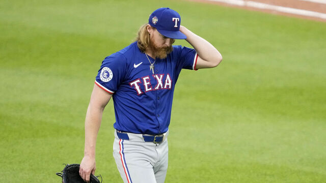 BALTIMORE, MD - JUNE 27: Jon Gray #22 of the Texas Rangers walks back to the dug out during a baseball game against Baltimore Orioles at the Oriole Park at Camden Yards on June 27, 2024 in Baltimore, Maryland.