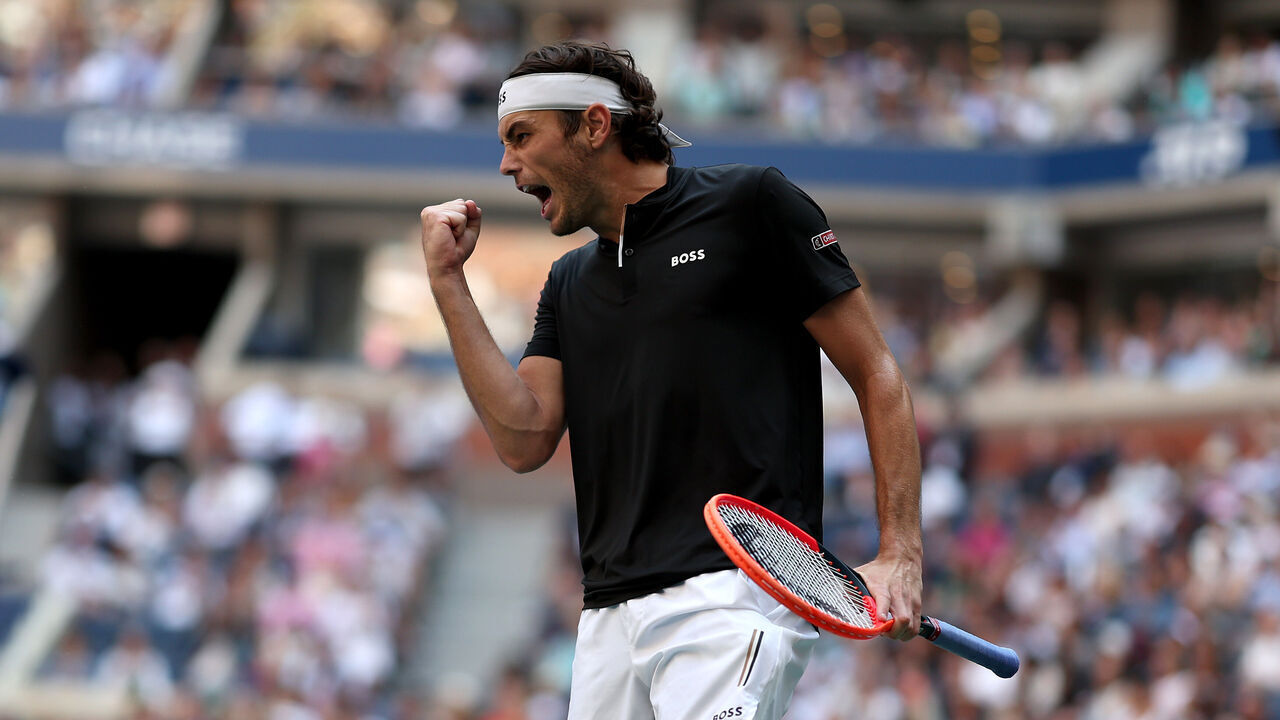 NEW YORK, NEW YORK - SEPTEMBER 03: Taylor Fritz of the United States celebrates a point against Alexander Zverev of Germany during their Men's Singles Quarterfinal match on Day Nine of the 2024 US Open at USTA Billie Jean King National Tennis Center on September 03, 2024 in the Flushing neighborhood of the Queens borough of New York City.