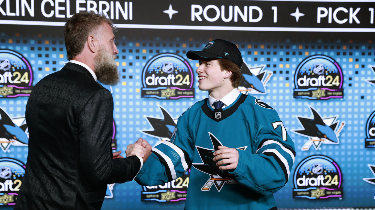 LAS VEGAS, NEVADA - JUNE 28: Macklin Celebrini shakes the hand of Joe Thornton onstage after being selected first overall by the San Jose Sharks during the first round of the 2024 Upper Deck NHL Draft at Sphere on June 28, 2024 in Las Vegas, Nevada.