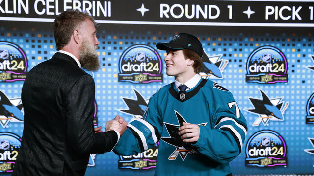 LAS VEGAS, NEVADA - JUNE 28: Macklin Celebrini shakes the hand of Joe Thornton onstage after being selected first overall by the San Jose Sharks during the first round of the 2024 Upper Deck NHL Draft at Sphere on June 28, 2024 in Las Vegas, Nevada.
