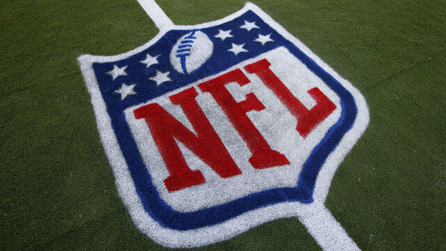 KANSAS CITY, MISSOURI - SEPTEMBER 04: The NFL shield logo painted on the grass field in preparation of the NFL Kickoff matchup between the Kansas City Chiefs and Baltimore Ravens at GEHA Field at Arrowhead Stadium on September 04, 2024 in Kansas City, Missouri.