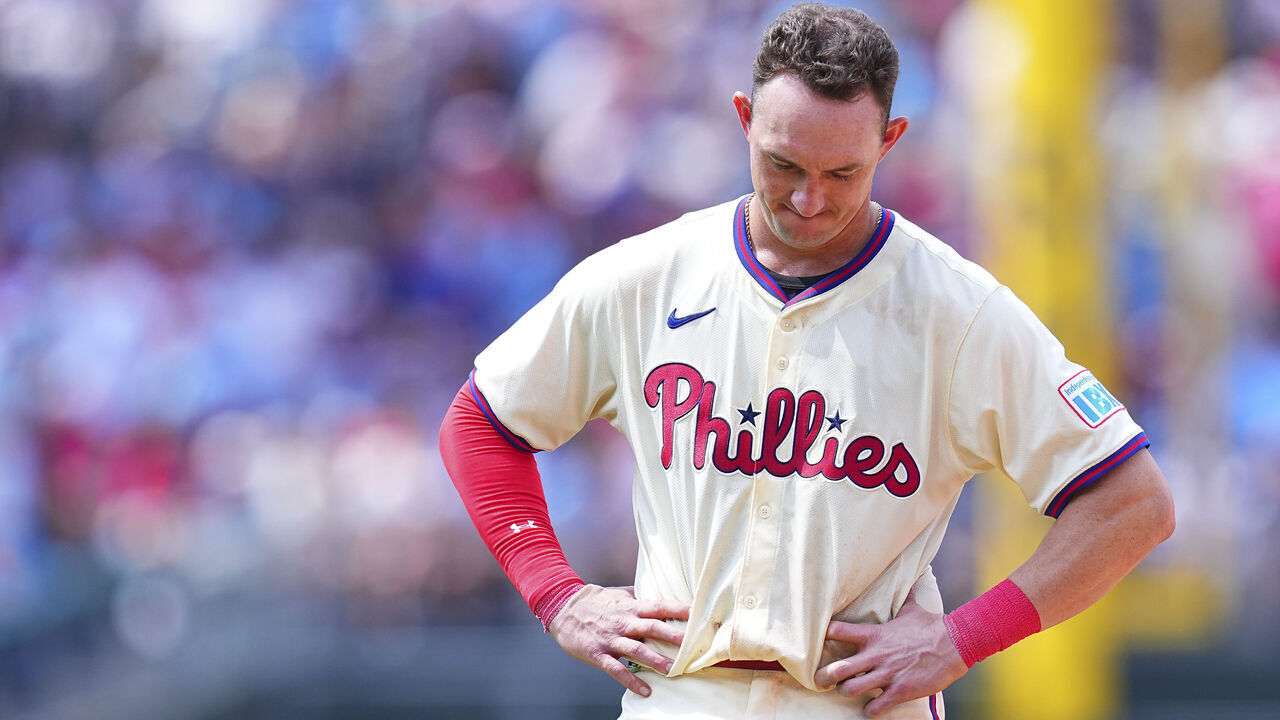PHILADELPHIA, PENNSYLVANIA - JULY 31: Austin Hays #9 of the Philadelphia Phillies looks on after flying out to end the seventh inning against the New York Yankees at Citizens Bank Park on July 31, 2024 in Philadelphia, Pennsylvania. The Yankees defeated the Phillies 6-5.