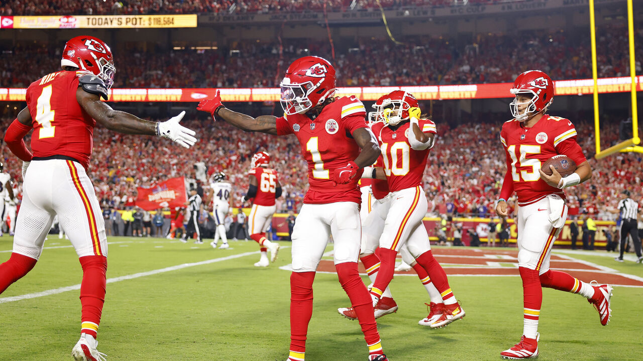 KANSAS CITY, MISSOURI - SEPTEMBER 05: Xavier Worthy #1 of the Kansas City Chiefs celebrates his touchdown with teammate Rashee Rice #4 as they play against the Baltimore Ravens during the first quarter at GEHA Field at Arrowhead Stadium on September 05, 2024 in Kansas City, Missouri.