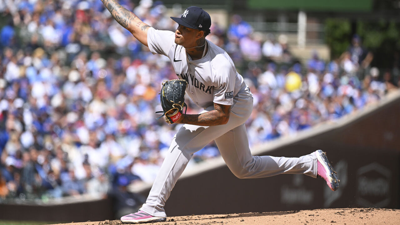 CHICAGO, ILLINOIS - SEPTEMBER 06: Luis Gil #81 of the New York Yankees throws a pitch during the first inning of a game against the Chicago Cubs at Wrigley Field on September 06, 2024 in Chicago, Illinois.