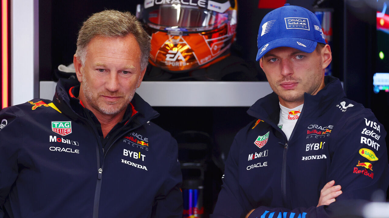 ZANDVOORT, NETHERLANDS - AUGUST 24: Max Verstappen of the Netherlands and Oracle Red Bull Racing interacts with Oracle Red Bull Racing Team Principal Christian Horner in the garage during final practice ahead of the F1 Grand Prix of Netherlands at Circuit Zandvoort on August 24, 2024 in Zandvoort, Netherlands.
