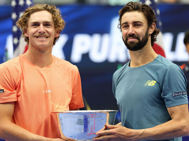 NEW YORK, NEW YORK - SEPTEMBER 07: Jordan Thompson (R) and Max Purcell (L) of Australia celebrates with their trophy after defeating Kevin Krawietz and Tim Puetz of Germany in their Men's Doubles Final match on Day Thirteen of the 2024 US Open at USTA Billie Jean King National Tennis Center on September 07, 2024 in the Flushing neighborhood of the Queens borough of New York City.