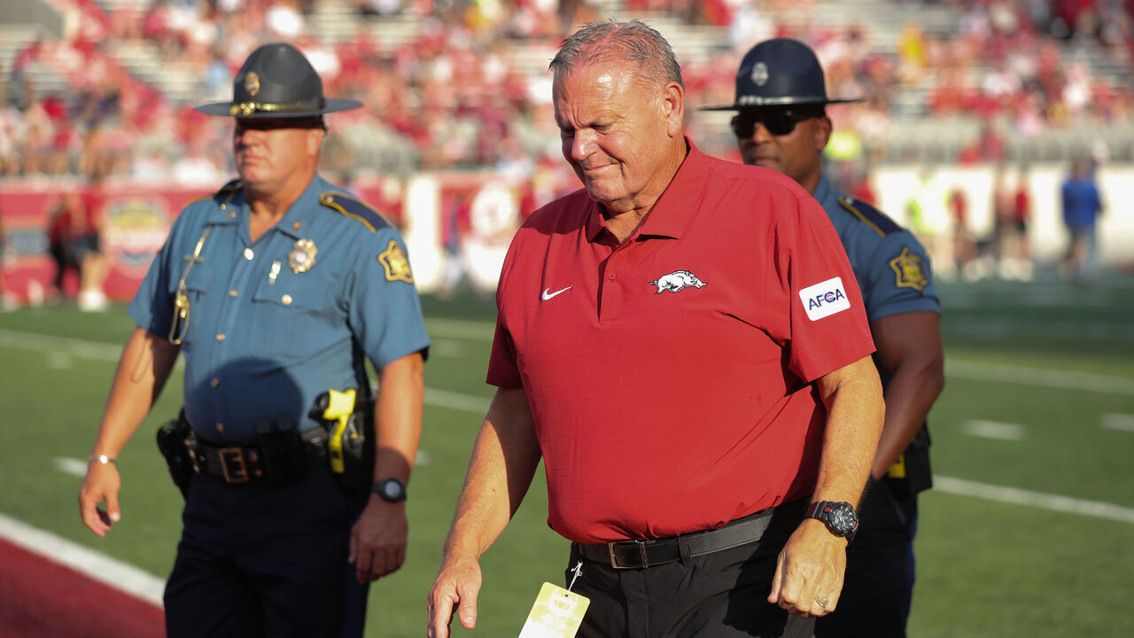 LITTLE ROCK, AR - AUGUST 29: Razorback coach Sam Pittman walks towards the tunnel following the pregame warm up period prior to the game between the Arkansas Razorbacks and the UAPB Golden Lions on August 29, 2024, at War Memorial Stadium in Little Rock, Arkansas.
