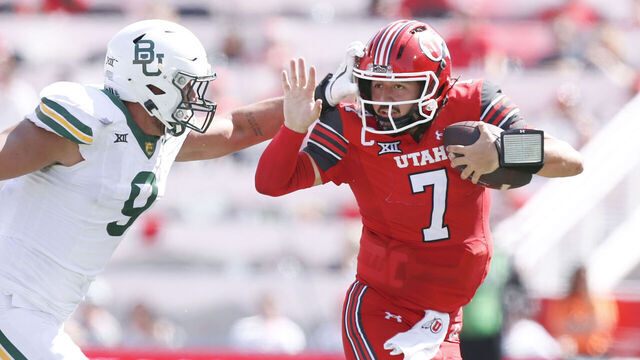 SALT LAKE CITY, UT - SEPTEMBER 7: Cameron Rising #7 of the Utah Utes tries to fend off Treven Ma'ae #9 of the Baylor Bears during the first half of their game at Rice Eccles Stadium on September 7, 2024 in Salt Lake City, Utah.