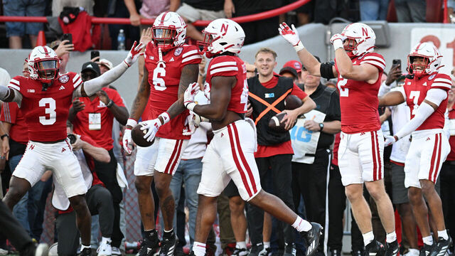LINCOLN, NEBRASKA - SEPTEMBER 07: Tommi Hill #6 of the Nebraska Cornhuskers celebrates a touchdown after an interception against the Colorado Buffaloes during the first quarter at Memorial Stadium on September 7, 2024 in Lincoln, Nebraska.