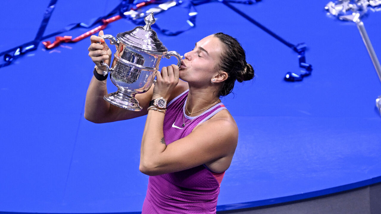 NEW YORK, USA - SEPTEMBER 7: Aryna Sabalenka of Belarus celebrates victory with the Women's Singles trophy on Day Thirteen of the 2024 US Open at USTA Billie Jean King National Tennis Center on September 7, 2024 in New York City.