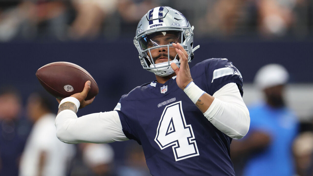 ARLINGTON, TX - AUGUST 24: Dak Prescott #4 of the Dallas Cowboys warms up before a preseason game between the Dallas Cowboys and the Los Angeles Chargers at AT&T Stadium on August 24, 2024 in Arlington, Texas.