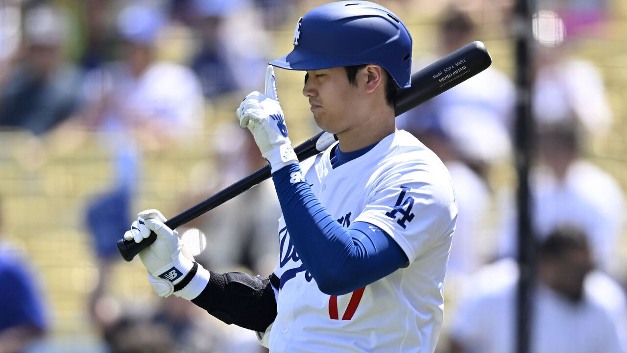 LOS ANGELES, CALIFORNIA - SEPTEMBER 8: Shohei Ohtani #17 of the Los Angeles Dodgers tips the brim of his hat before going to bat against the Cleveland Guardians in the first inning at Dodger Stadium on September 8, 2024 in Los Angeles, California.