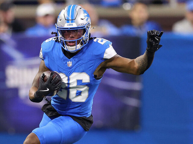 DETROIT, MICHIGAN - SEPTEMBER 08: Jahmyr Gibbs #26 of the Detroit Lions rushes with the ball against the Los Angeles Rams at Ford Field on September 08, 2024 in Detroit, Michigan.