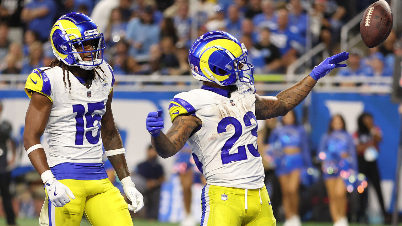 DETROIT, MICHIGAN - SEPTEMBER 08: Kyren Williams #23 of the Los Angeles Rams celebrates with Demarcus Robinson #15 after a 2-yard touchdown run against the Detroit Lions in the third quarter at Ford Field on September 08, 2024 in Detroit, Michigan.