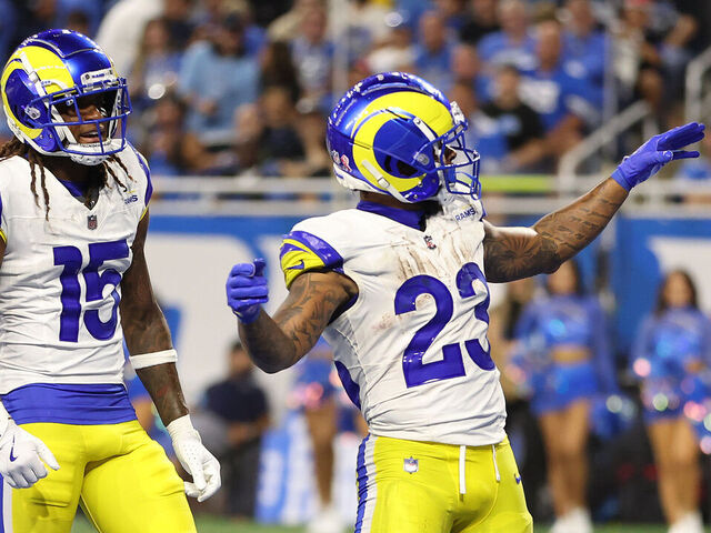 DETROIT, MICHIGAN - SEPTEMBER 08: Kyren Williams #23 of the Los Angeles Rams celebrates with Demarcus Robinson #15 after a 2-yard touchdown run against the Detroit Lions in the third quarter at Ford Field on September 08, 2024 in Detroit, Michigan.