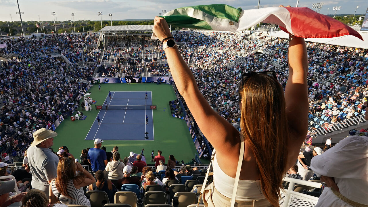 MASON, OHIO - AUGUST 19: A fan waves an Italian flag during the match between Frances Tiafoe of the United States and Jannik Sinner of Italy during the Final Day of the Cincinnati Open at the Lindner Family Tennis Center on August 19, 2024 in Mason, Ohio.