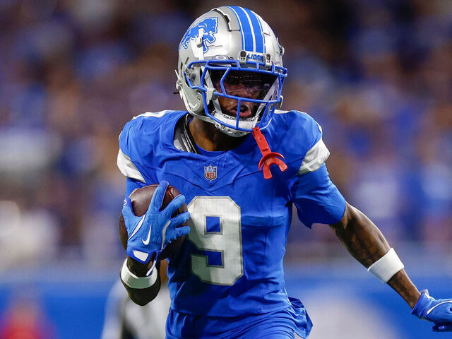 DETROIT, MICHIGAN - SEPTEMBER 8: Jameson Williams #9 of the Detroit Lions runs with the ball in the first half during an NFL football game against the Los Angeles Rams at Ford Field on September 8, 2024 in Detroit, Michigan.