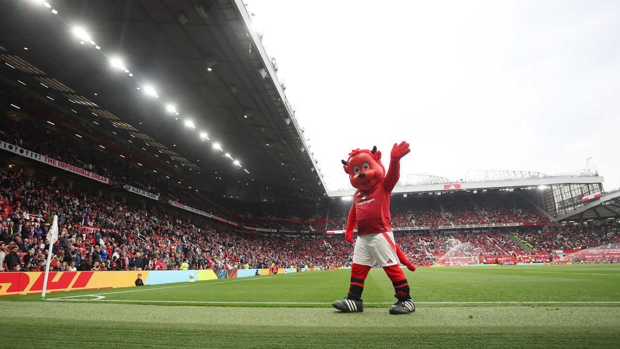 MANCHESTER, ENGLAND - SEPTEMBER 01: General view as Manchester United mascot Fred the Red waves during the Premier League match between Manchester United FC and Liverpool FC at Old Trafford on September 01, 2024 in Manchester, England.